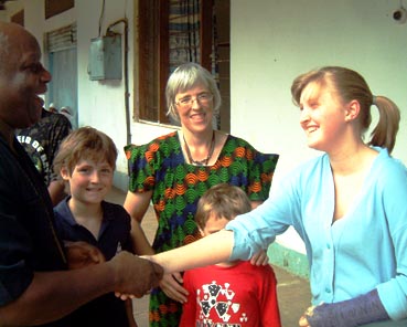 +Simon Chiwanga shakes hands with Esther at their farewell