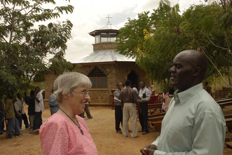 Rachel Speaks to Joseph Mlulu following the consecration of St. Luke's Chapel